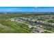 A beautiful aerial view of the community with numerous waterfront properties at 1167 Boundary Blvd, Rotonda West, FL 33947