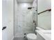 Bathroom featuring a glass shower, a tiled floor, and modern copper fixtures at 1167 Boundary Blvd, Rotonda West, FL 33947
