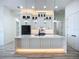 Modern kitchen features sleek design, custom cabinets, and stunning countertops at 1167 Boundary Blvd, Rotonda West, FL 33947