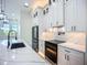 The kitchen features stainless steel appliances, custom cabinets, and a center island at 1167 Boundary Blvd, Rotonda West, FL 33947