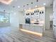 Gourmet kitchen features custom cabinets, oversized island, and stainless steel appliances at 1167 Boundary Blvd, Rotonda West, FL 33947