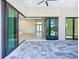 View from patio to front door and kitchen with island at 1167 Boundary Blvd, Rotonda West, FL 33947