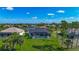 Aerial view of the home showcasing a screened pool and backyard at 1167 Boundary Blvd, Rotonda West, FL 33947