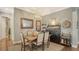 Cozy dining room with stylish bar and wine storage at 13220 Swiftwater Way, Lakewood Ranch, FL 34211