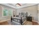 The main bedroom includes a ceiling fan and windows with blinds at 13220 Swiftwater Way, Lakewood Ranch, FL 34211