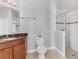 Bathroom features a glass shower, a toilet, and a granite countertop vanity at 13503 22Nd E Ct, Parrish, FL 34219