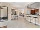 Spacious living area connecting kitchen, dining, and lounge spaces, with ample natural light at 13503 22Nd E Ct, Parrish, FL 34219