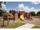 Fun playground with slides, climbing structures, and a soft landing surface for safe play at 13503 22Nd E Ct, Parrish, FL 34219