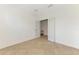 Bright office space featuring neutral walls, tile flooring, and double doors at 1375 Backspin Dr, Englewood, FL 34223