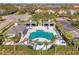 Community pool and surrounding landscaping at 1375 Backspin Dr, Englewood, FL 34223