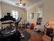 Workout room with exercise equipment, wood floors, and a built in mirror at 14714 5Th Ne Ter, Bradenton, FL 34212