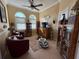 Cozy living room featuring comfortable seating, ample natural light from large windows, and stylish decor at 14714 5Th Ne Ter, Bradenton, FL 34212