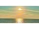 Gorgeous waterfront view with calm water and shimmering sunlight at 1500 Sunset Rd # B4, Tarpon Springs, FL 34689