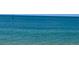 Relaxing view of the calm, tranquil ocean waters with a clear blue sky at 1500 Sunset Rd # B4, Tarpon Springs, FL 34689