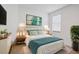 Bright bedroom with white walls, stylish decor, and furnishings for a modern, comfortable living space at 15344 Serene Shores Loop, Bradenton, FL 34211