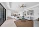 Open-concept living room with tile flooring and lots of natural light at 15344 Serene Shores Loop, Bradenton, FL 34211