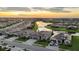 Inviting street view showcasing modern homes, well-manicured lawns, and a tranquil neighborhood setting at 15344 Serene Shores Loop, Bradenton, FL 34211