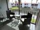 Relaxing patio offers a tranquil view of the canal and nearby condo buildings at 1801 Gulf N Dr # 207, Bradenton Beach, FL 34217