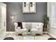 Sophisticated living room with comfortable seating, decorative accents, and ample natural light at 19351 Ranchview Ct, Land O Lakes, FL 34638