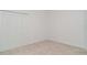 Neutral carpeted bedroom featuring a closet at 2108 Citrus Breeze Dr, Bradenton, FL 34208