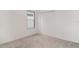 Bedroom with carpeted floor, window, and closet at 2108 Citrus Breeze Dr, Bradenton, FL 34208