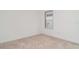 Bedroom featuring carpeted floors and a window at 2108 Citrus Breeze Dr, Bradenton, FL 34208