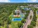An aerial view of the community, including the pool, playground, tennis and basketball courts at 2347 123Rd E Pl, Parrish, FL 34219