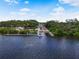 Community boat ramp leads to calm river waters, under sunny skies and scattered clouds at 2347 123Rd E Pl, Parrish, FL 34219