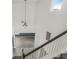 View of the foyer from the top of the stairs showing the height and chandelier at 2347 123Rd E Pl, Parrish, FL 34219