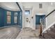 Elegant foyer with staircase, hardwood floors, and a welcoming entryway to the home at 2347 123Rd E Pl, Parrish, FL 34219