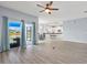 Inviting living room seamlessly connects to the dining area and kitchen, creating an open and airy space at 2347 123Rd E Pl, Parrish, FL 34219