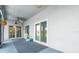 Covered patio features view to kitchen and living room at 2347 123Rd E Pl, Parrish, FL 34219