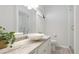 Bathroom featuring a vessel sink, marble countertop, and glass shower at 2383 Lakeside Mews # D3, Sarasota, FL 34235