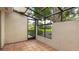 View of the screened-in patio area at 2383 Lakeside Mews # D3, Sarasota, FL 34235