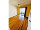 Bright bedroom with hardwood floors and access to a patio through a sliding glass door at 2607 29Th W Ave, Bradenton, FL 34205