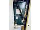 Indoor HVAC unit, with visible components and labels, in a closet at 2607 29Th W Ave, Bradenton, FL 34205