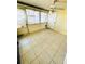 Enclosed sun room or patio with tiled floor at 2607 29Th W Ave, Bradenton, FL 34205