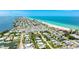 Aerial view of the coastal community, showcasing proximity to the beach, waterways, and charming neighborhood at 2713 Avenue C, Holmes Beach, FL 34217
