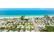 Stunning aerial view of the home's location near the beach, showcasing the beautiful coastal setting and community at 2713 Avenue C, Holmes Beach, FL 34217