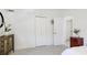Bright bedroom with closet, tasteful decor, and ensuite bathroom at 2713 Avenue C, Holmes Beach, FL 34217
