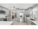 Bright kitchen featuring stainless steel appliances, white countertops, and ample storage at 2713 Avenue C, Holmes Beach, FL 34217