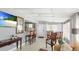 Bright living area open to the kitchen, offering seating and a dining space at 2713 Avenue C, Holmes Beach, FL 34217