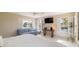 Bedroom featuring natural light, a comfortable sofa, and views of the outdoors at 2807 Coral Way, Punta Gorda, FL 33950
