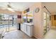 Kitchen pass-through bar to the outdoor patio and pool at 2807 Coral Way, Punta Gorda, FL 33950