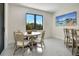 Dining area with round table, chairs, recessed lighting, and a view to the exterior at 289 Long Meadow Ln, Rotonda West, FL 33947