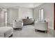 Neutral sitting area featuring contemporary seating and a dresser at 289 Long Meadow Ln, Rotonda West, FL 33947