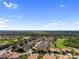 Expansive community with well-maintained homes, golf courses, and picturesque lakes at 305 Siena Vista Pl, Sun City Center, FL 33573