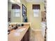 Bathroom featuring a single vanity, a mirror, a walk-in tub, and beige tile flooring at 305 Siena Vista Pl, Sun City Center, FL 33573