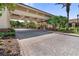Elegant covered entrance with manicured landscaping at Sun City Center at 305 Siena Vista Pl, Sun City Center, FL 33573