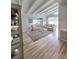 Bright living room featuring wood floors, vaulted ceilings, and comfortable seating at 3727 Dover Dr, Sarasota, FL 34235